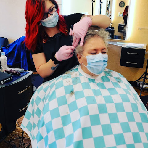 A Cut Above Barber and Stylist Lounge